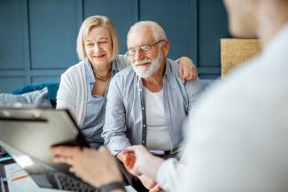 retired couple at financial advisor meeting